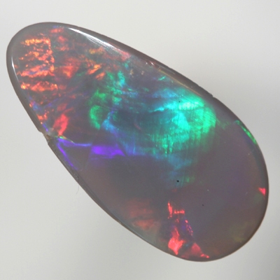 SOLID SEMI BLACK OPAL Large and bright red rolling flash turns to green in a Flame pattern